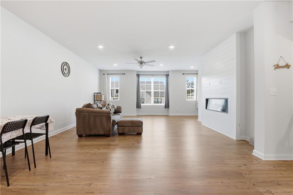 3535 Senna Road Duluth, GA 30096 - Photo 30 of 60 a view of a livingroom with furniture and wooden floor