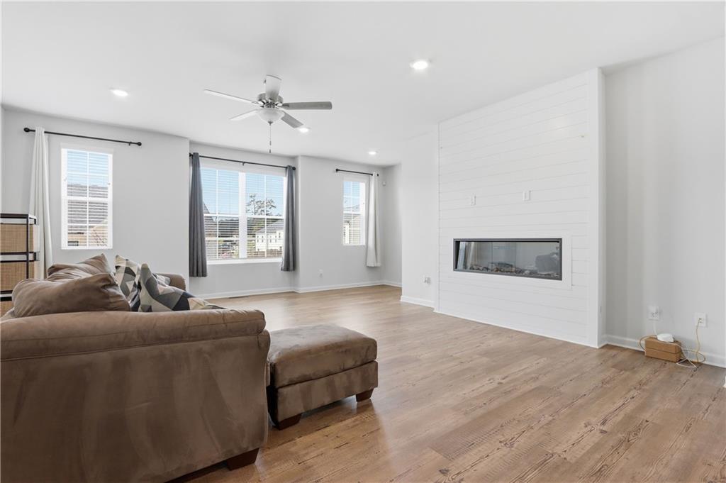 3535 Senna Road Duluth, GA 30096 - Photo 31 of 60 a living room with furniture and a window