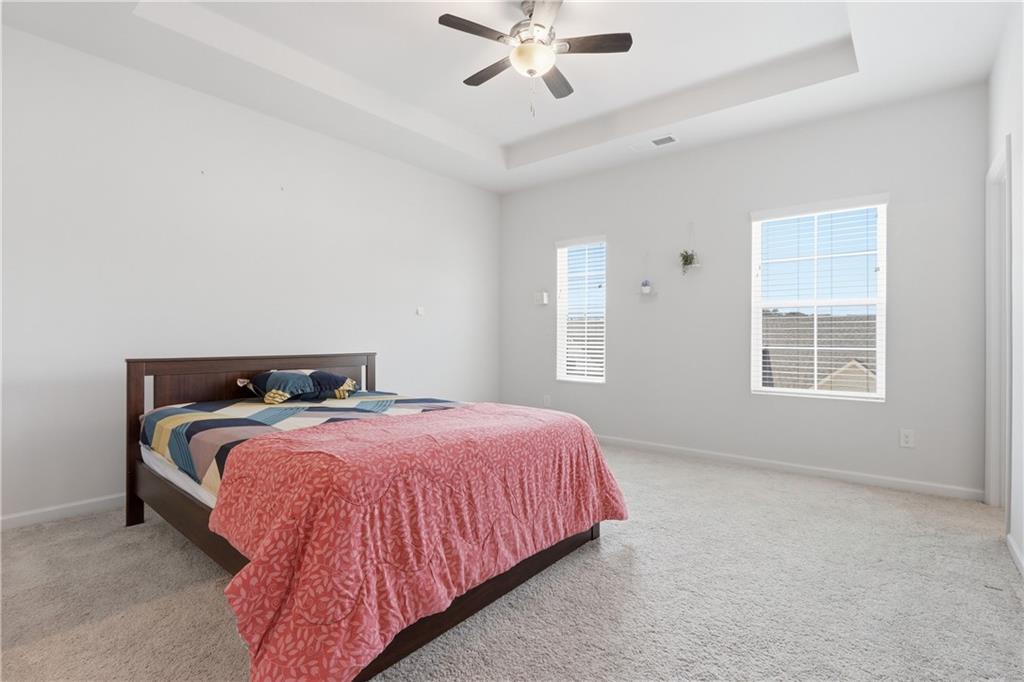 3535 Senna Road Duluth, GA 30096 - Photo 50 of 60 a bedroom with a bed and window