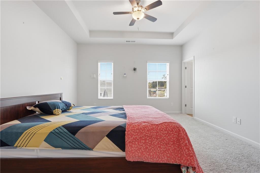 3535 Senna Road Duluth, GA 30096 - Photo 52 of 60 a bedroom with a bed and window