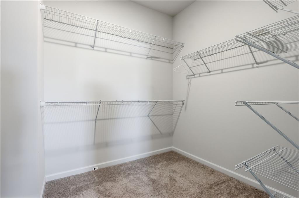 3535 Senna Road Duluth, GA 30096 - Photo 55 of 60 a view of a room with racks on the wall