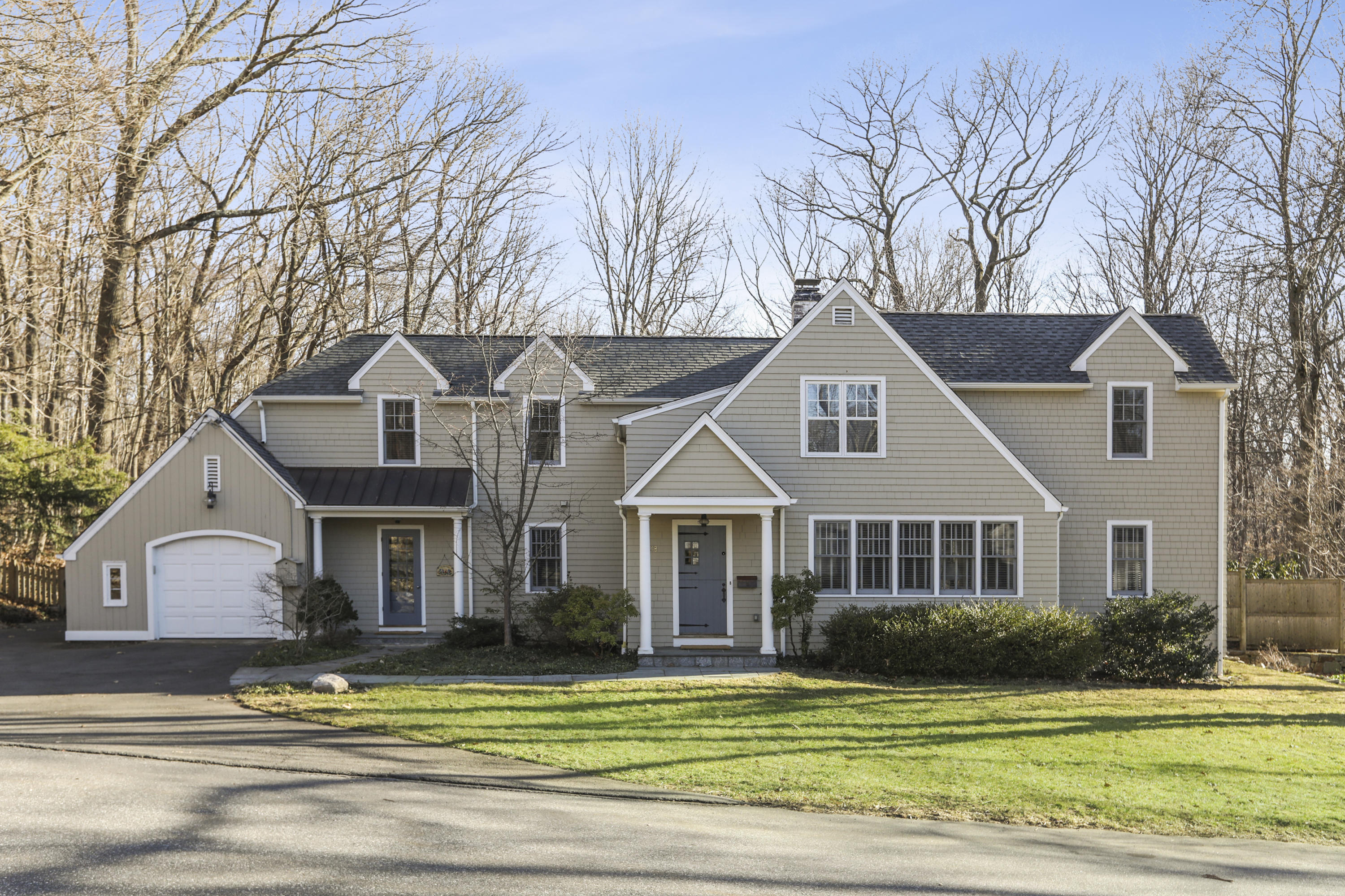 38 Intervale Road Darien, CT 06820 - Photo 1 of 30 a front view of a house with a yard