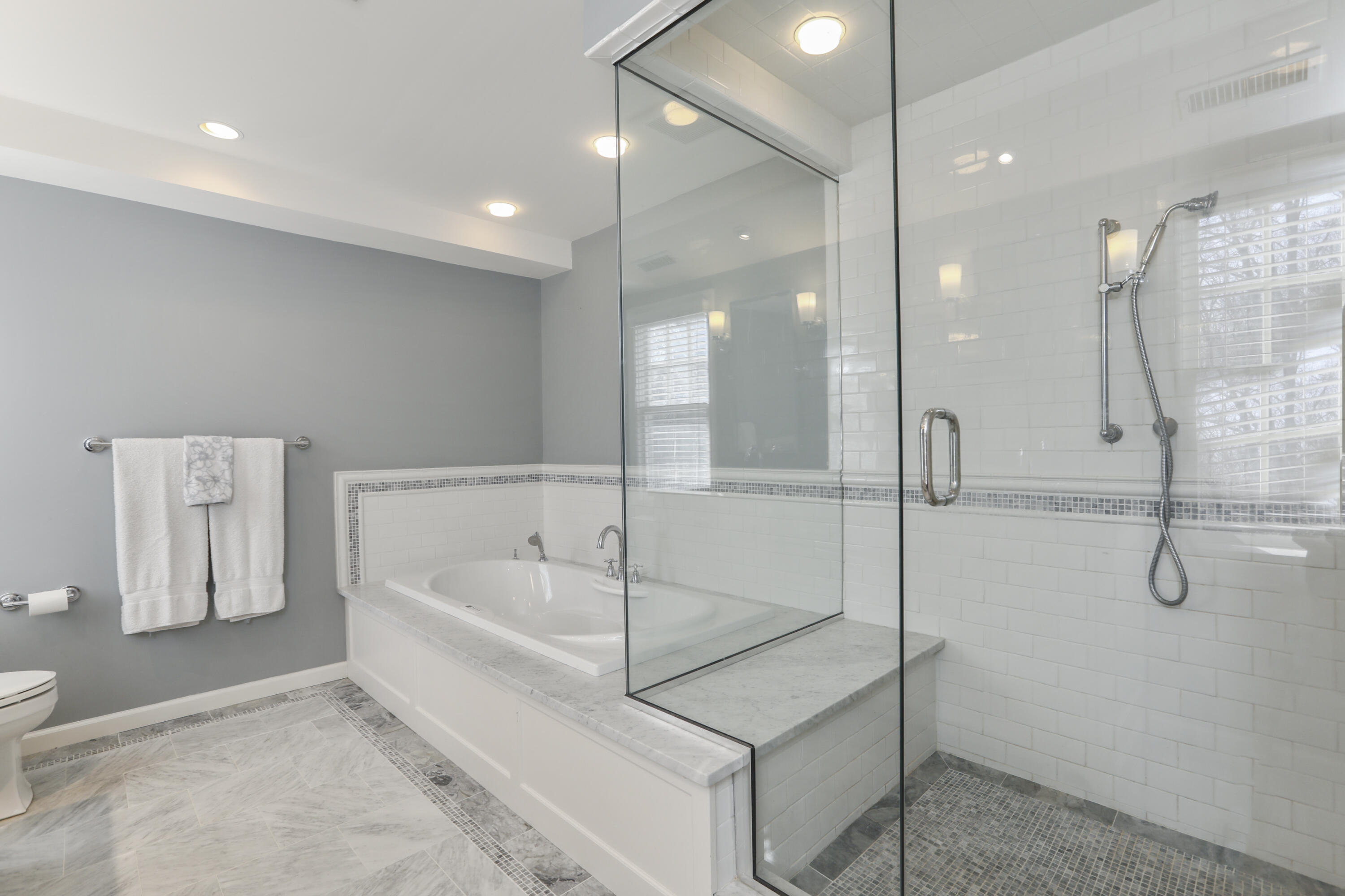 38 Intervale Road Darien, CT 06820 - Photo 17 of 30 a bathroom with a tub and shower