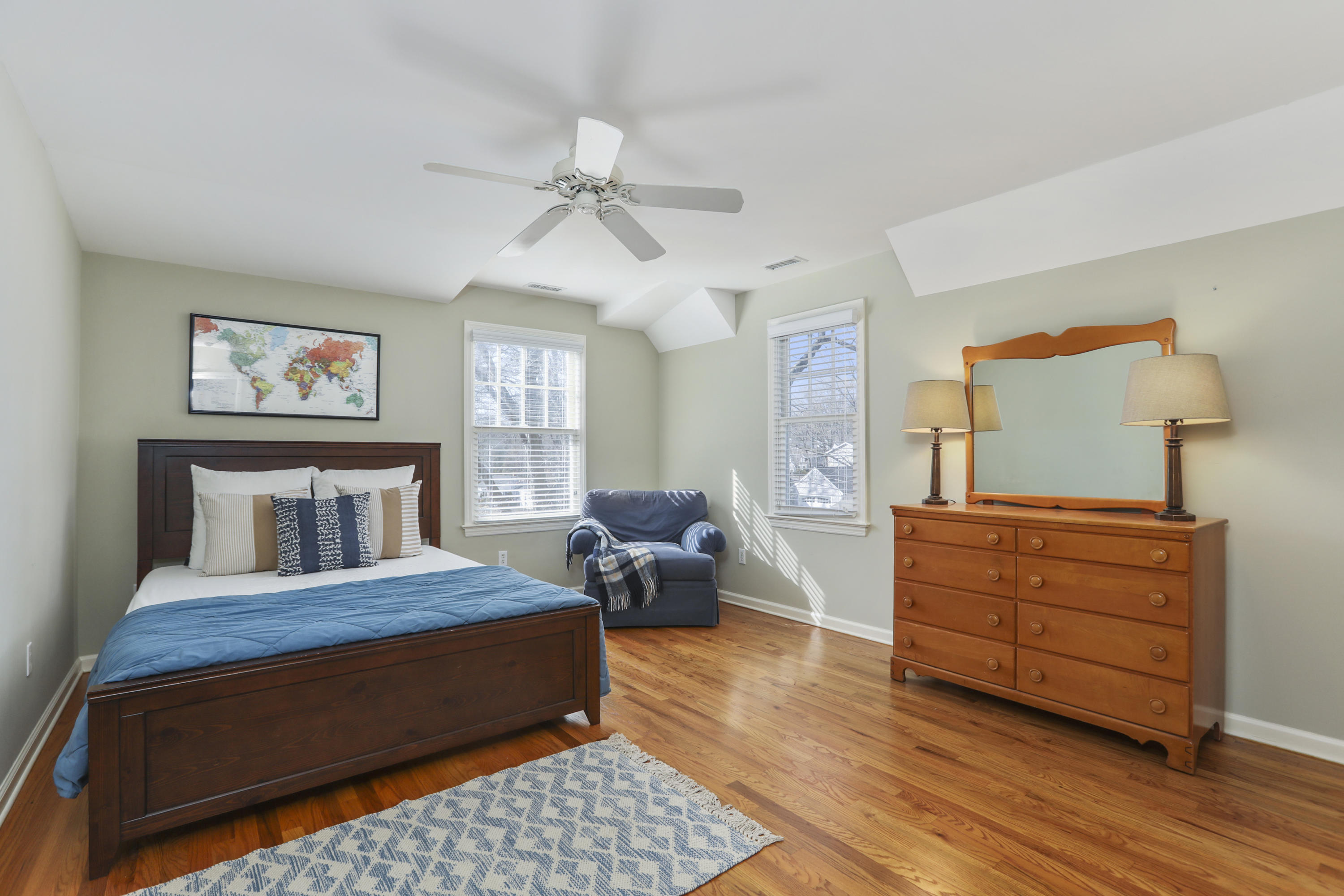 38 Intervale Road Darien, CT 06820 - Photo 19 of 30 a bedroom with a bed and wooden floor