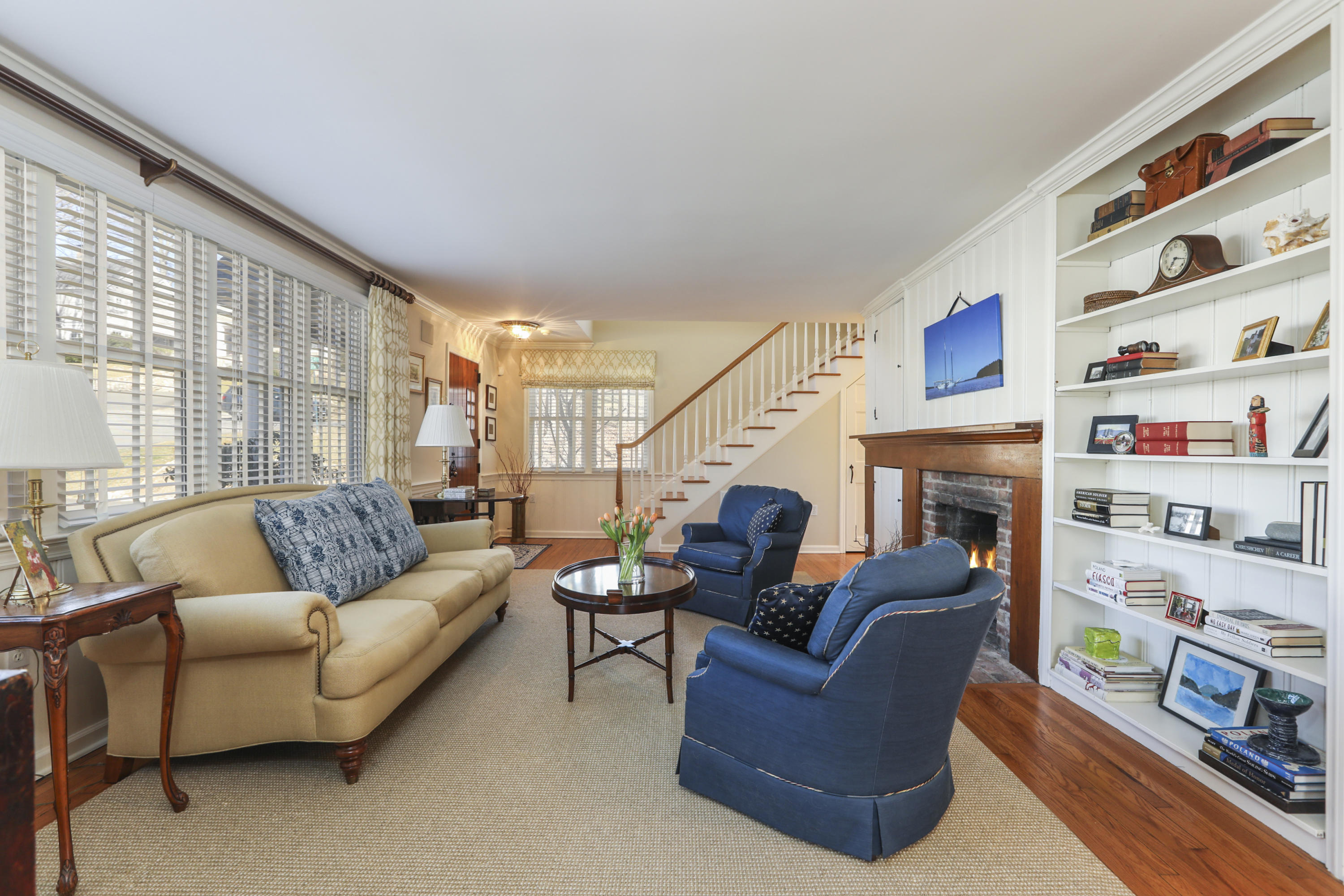 38 Intervale Road Darien, CT 06820 - Photo 3 of 30 a living room with furniture a fireplace and a large window