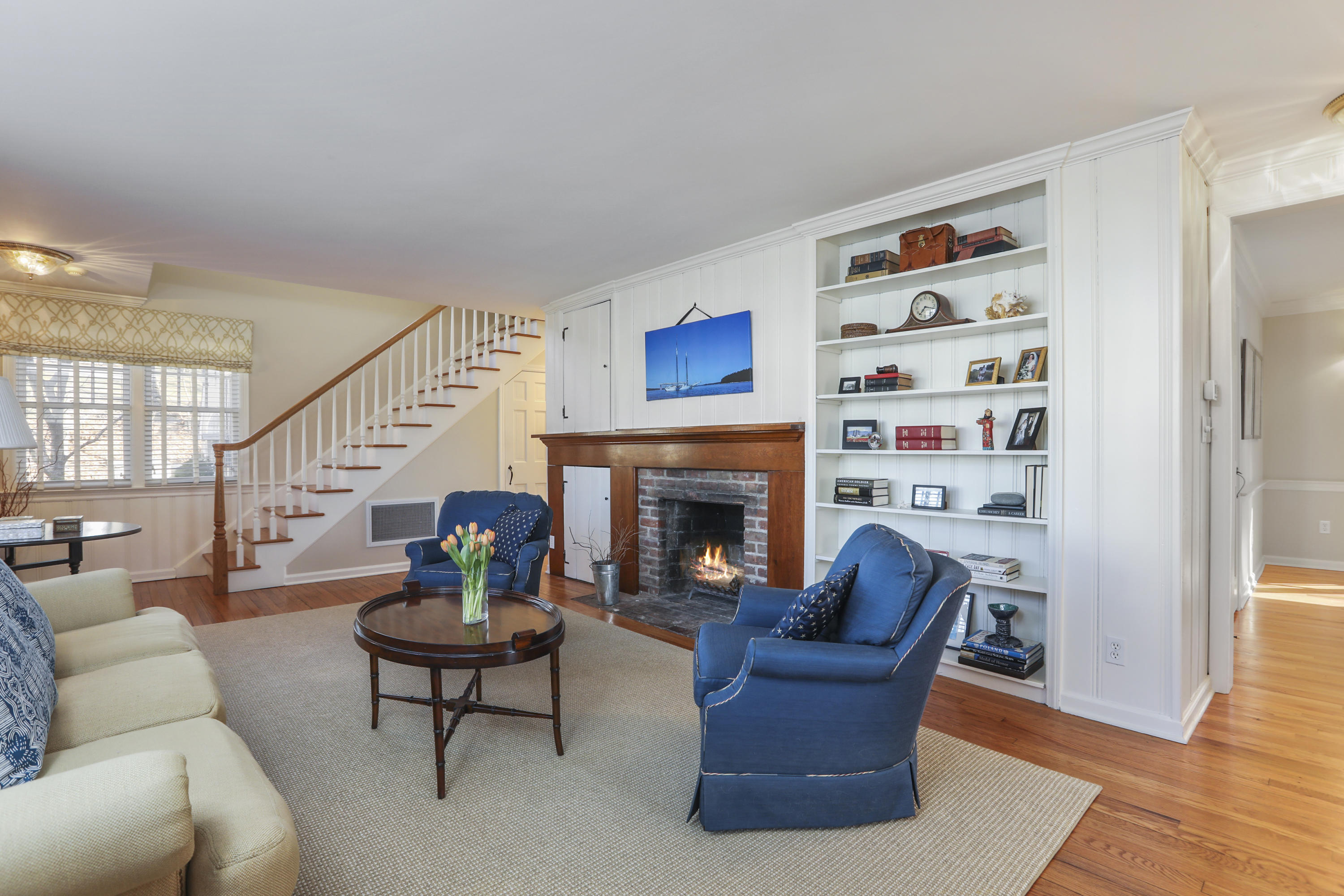 38 Intervale Road Darien, CT 06820 - Photo 4 of 30 a living room with furniture and a fireplace