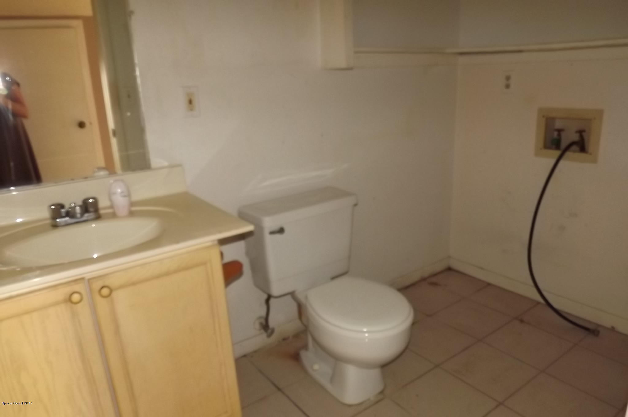 3815 Tree Ridge Lane Northeast Palm Bay, FL 32905 - Photo 7 of 12 3815 Tree Ridge Ln - Half Bath (Laundry)