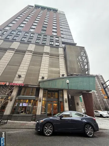 a car parked in front of a building
