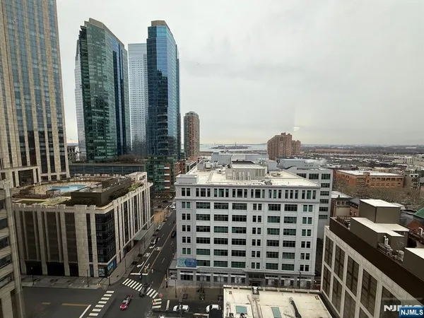 a view of a city with tall buildings
