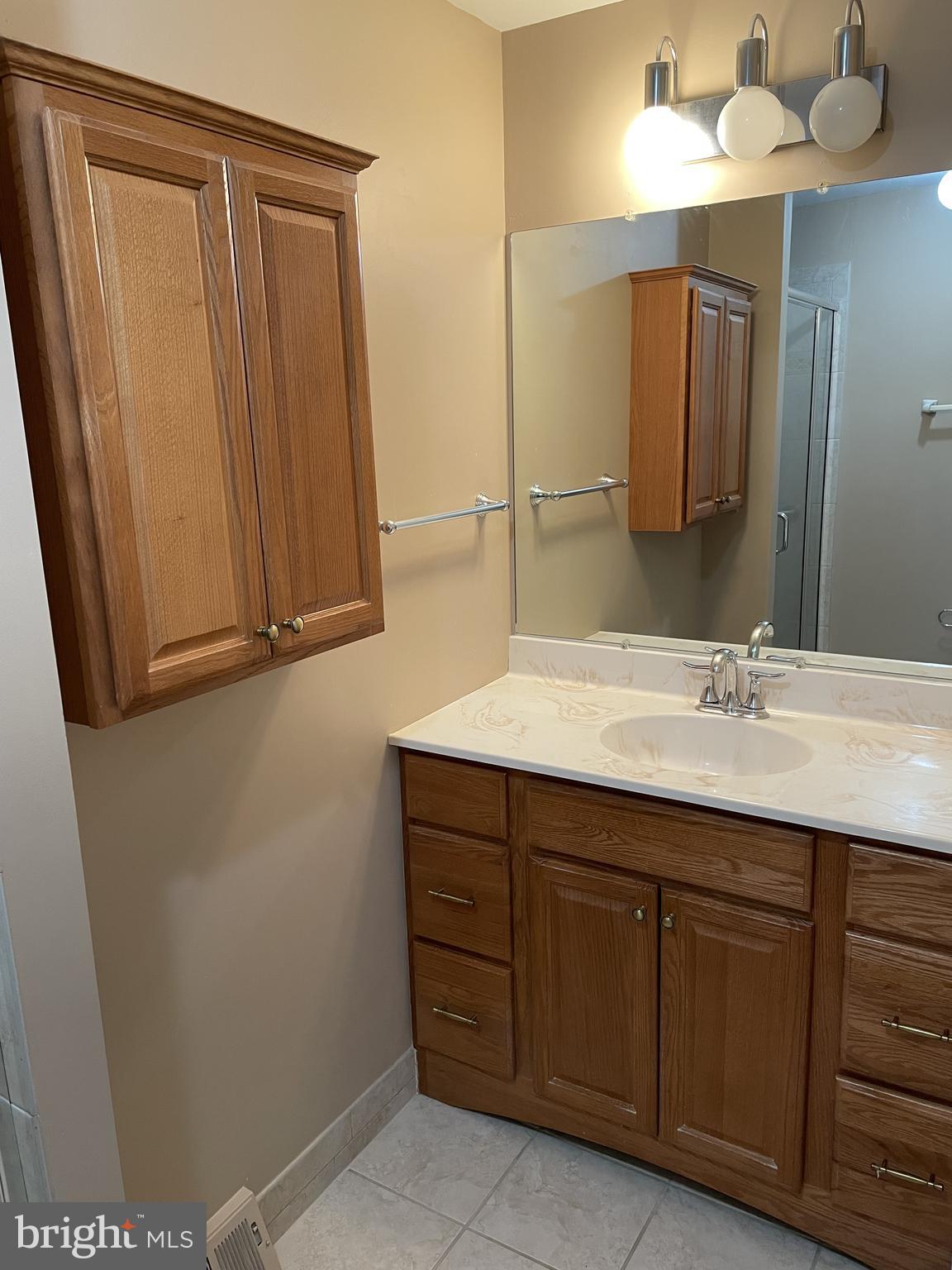 4 Independence Place Newtown, PA 18940 - Photo 12 of 23 a bathroom with a sink and a mirror