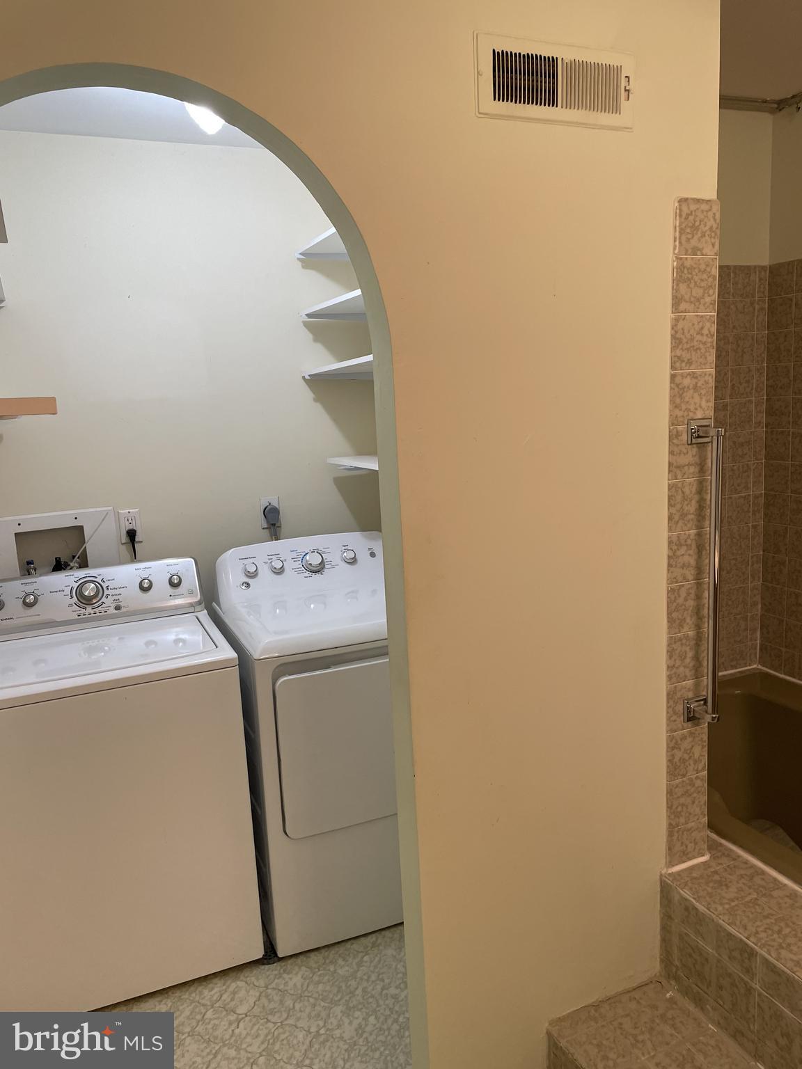 4 Independence Place Newtown, PA 18940 - Photo 14 of 23 a utility room with dryer and washer