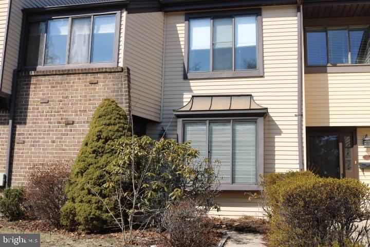 4 Independence Place Newtown, PA 18940 - Photo 2 of 23 a brick house with a large windows