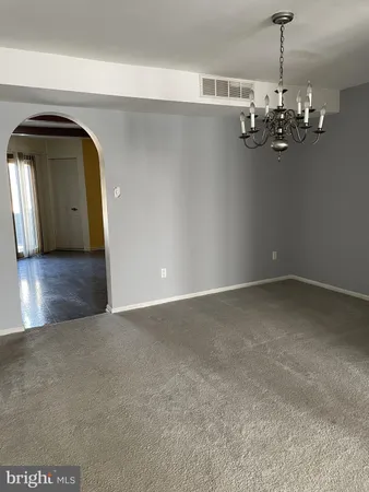 a view of a livingroom with a chandelier
