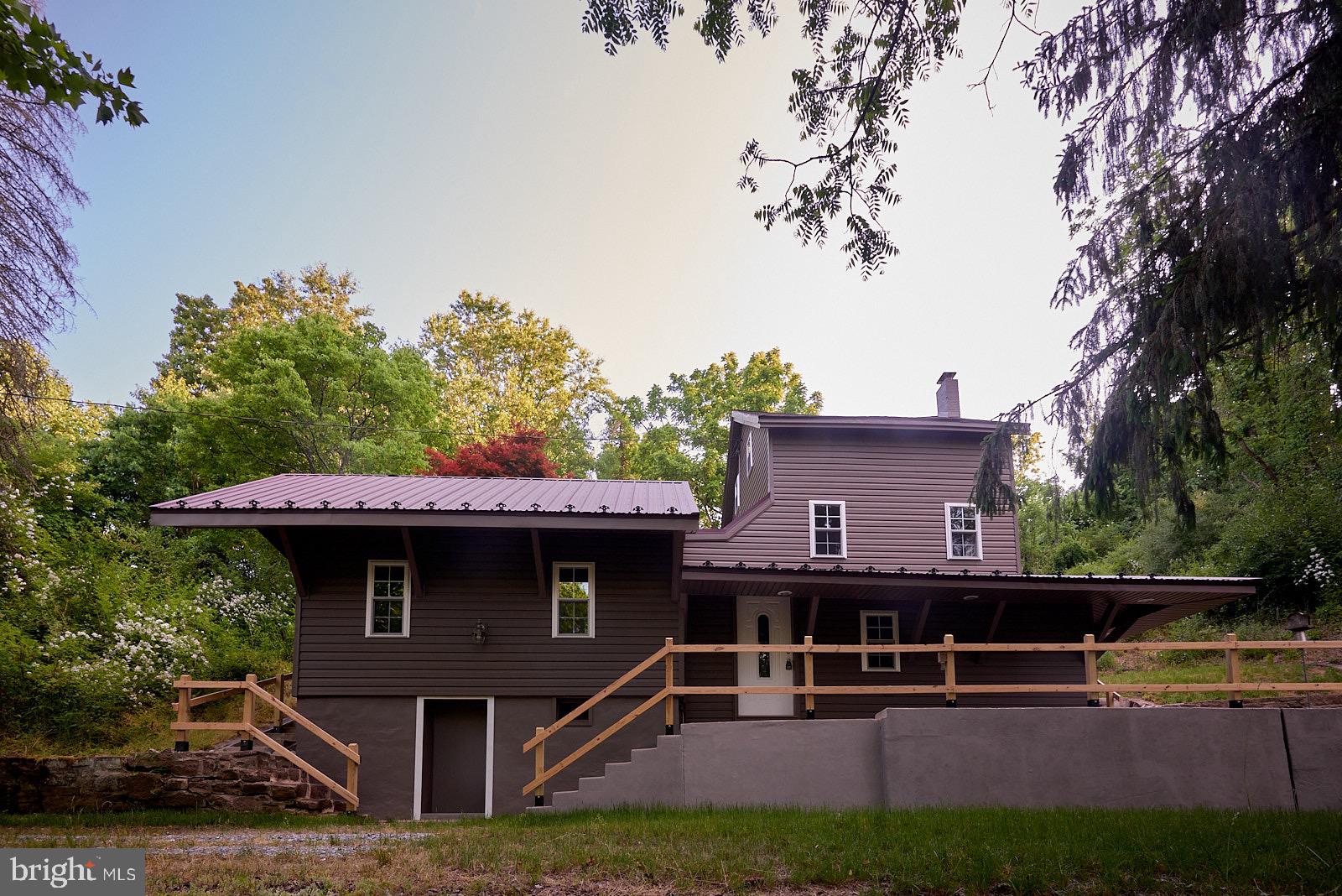 1321 Wyomissing Road Mohnton, PA 19540 - Photo 2 of 30 a front view of a house with garden