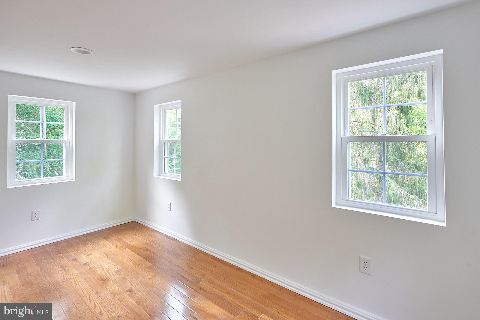 1321 Wyomissing Road Mohnton, PA 19540 - Photo 24 of 30 a view of empty room with wooden floor and fan