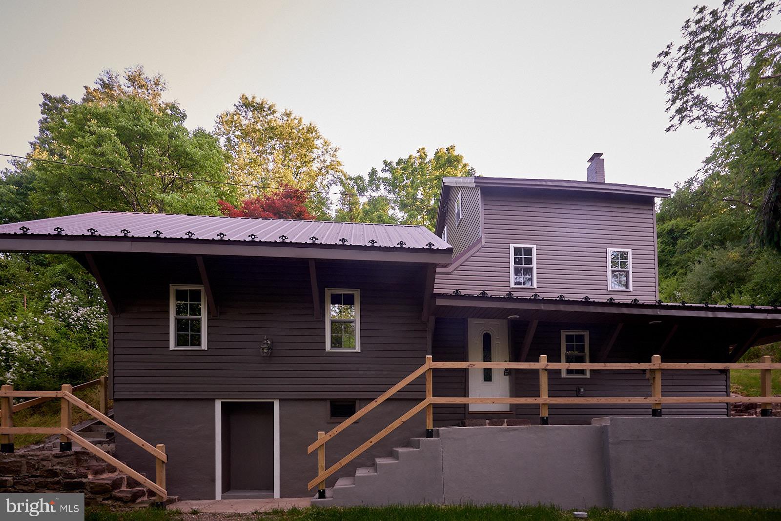 1321 Wyomissing Road Mohnton, PA 19540 - Photo 3 of 30 a front view of a house with balcony