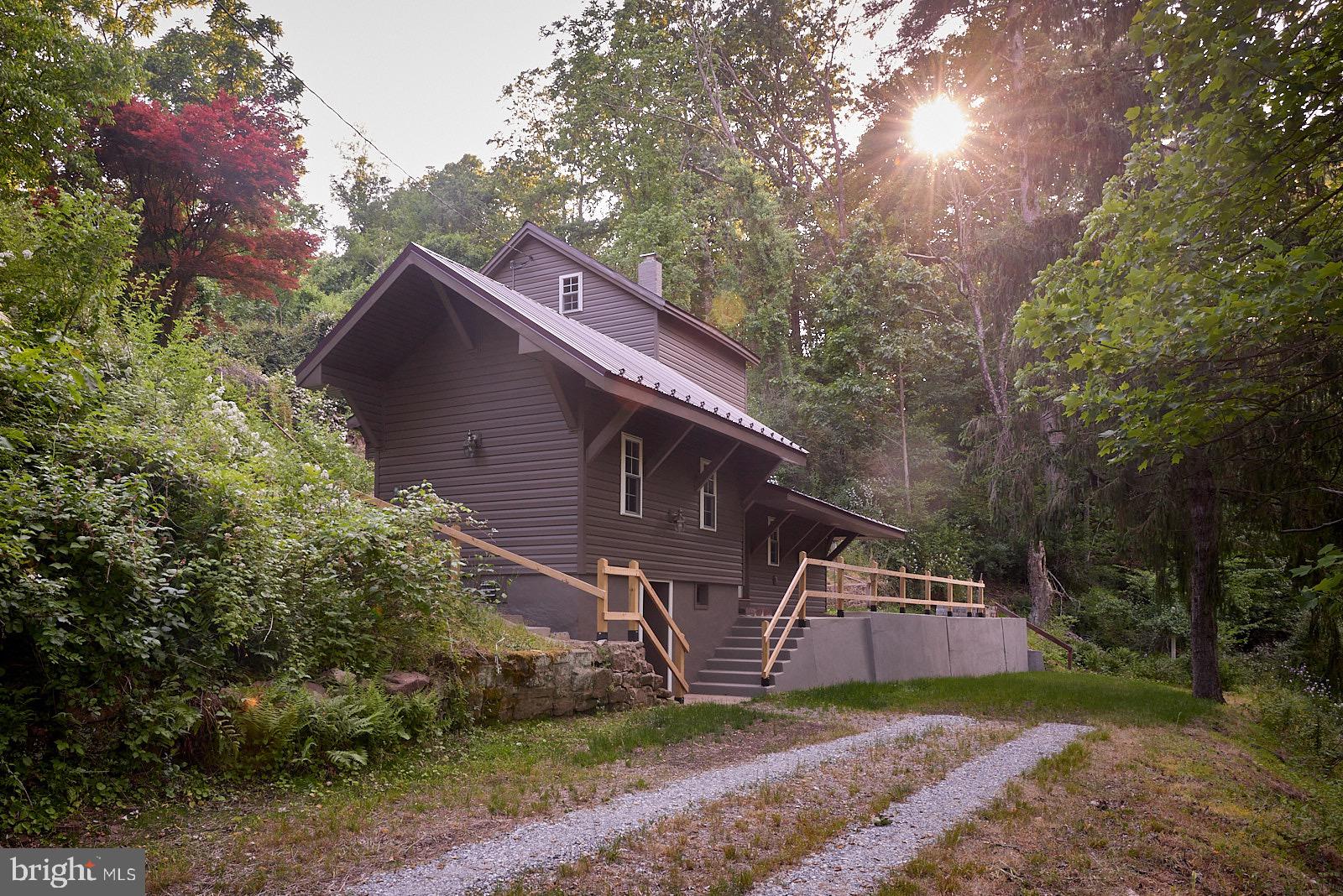 1321 Wyomissing Road Mohnton, PA 19540 - Photo 5 of 30 a view of a house with a yard
