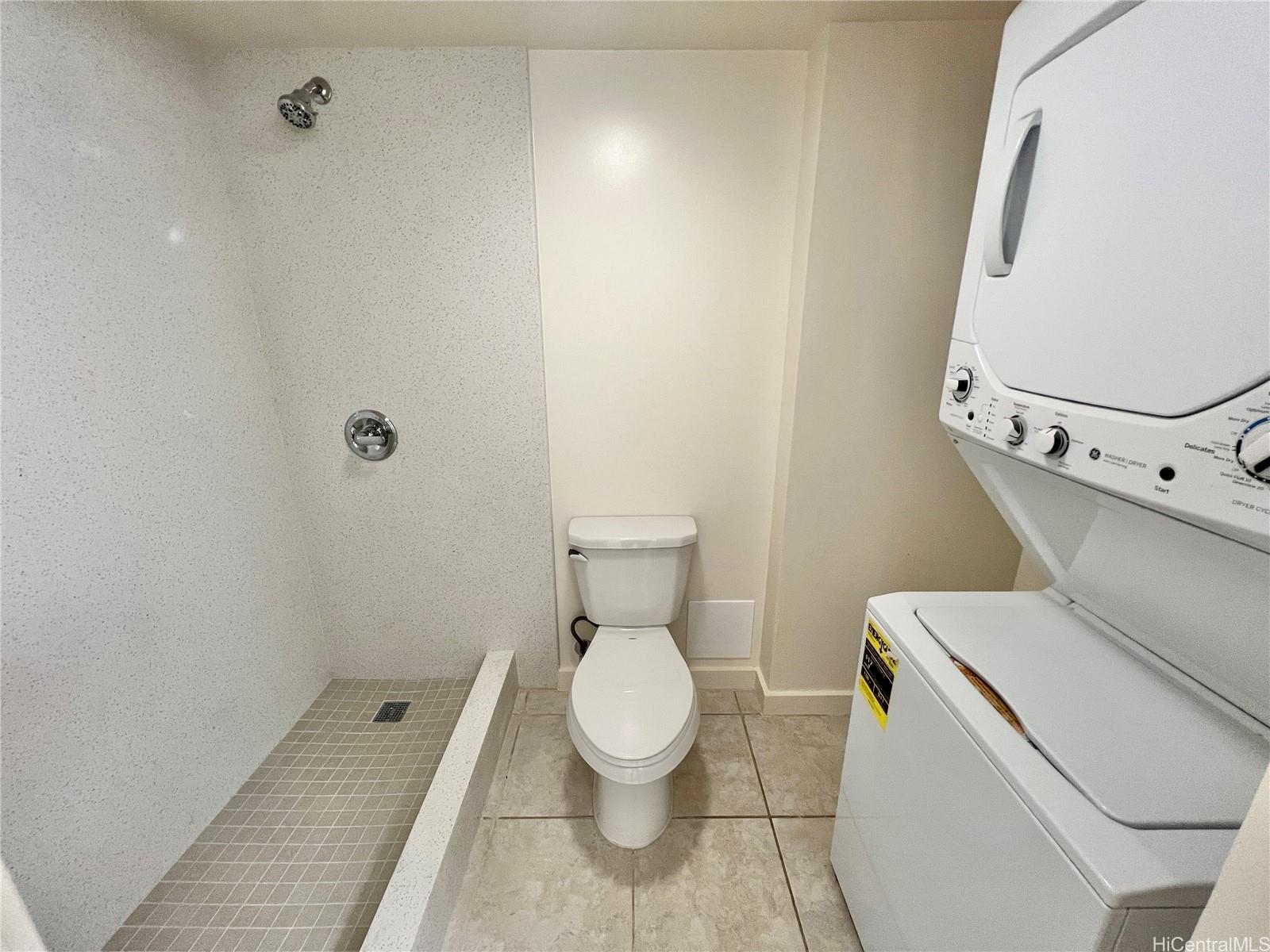 98-402 Koauka Loop, Unit 2113 Aiea, HI 96701 - Photo 5 of 7 a white toilet sitting next to a bathroom sink