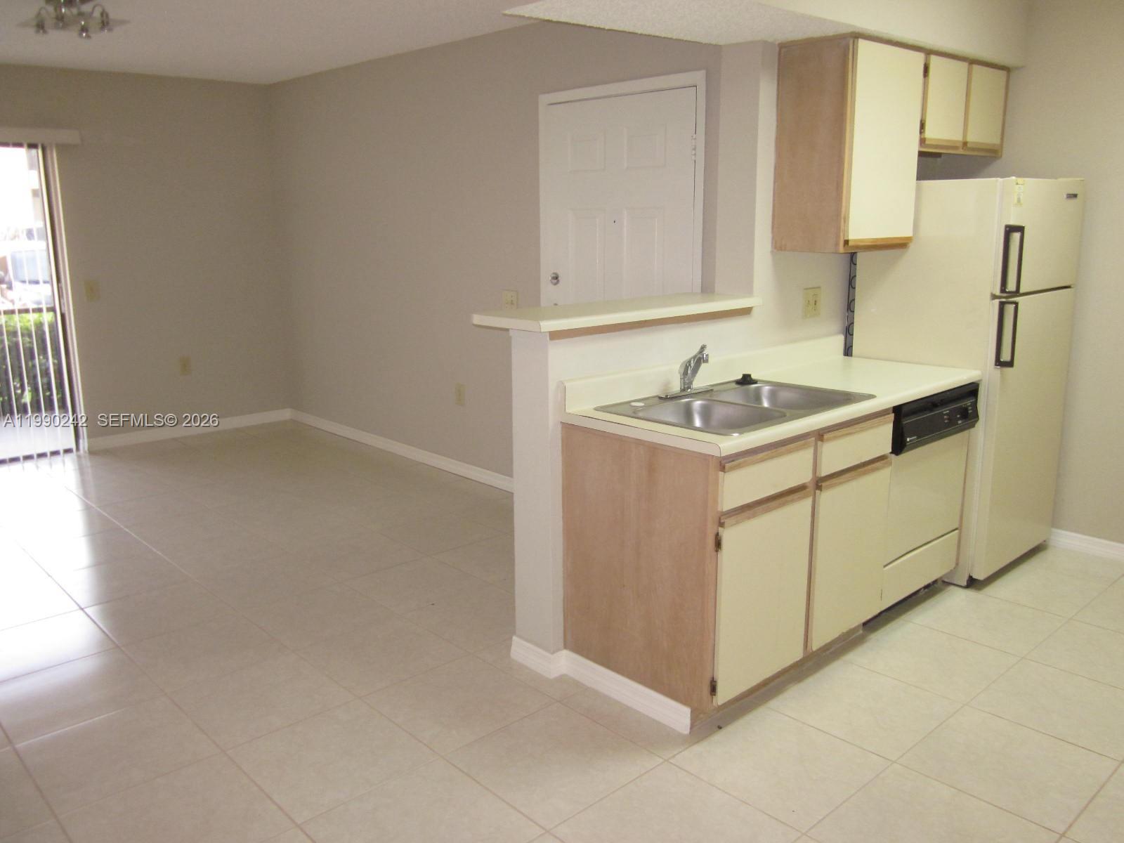 15051 Southwest 103rd Lane, Unit 4103 Miami, FL 33196 - Photo 5 of 19 a utility room with washer and dryer