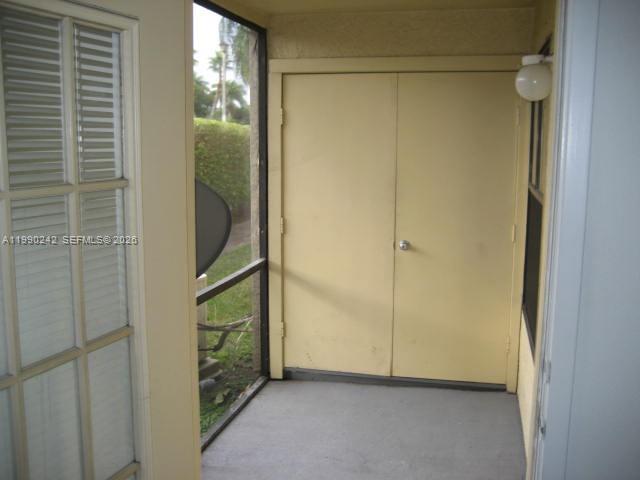 15051 Southwest 103rd Lane, Unit 4103 Miami, FL 33196 - Photo 7 of 19 a view of an front door