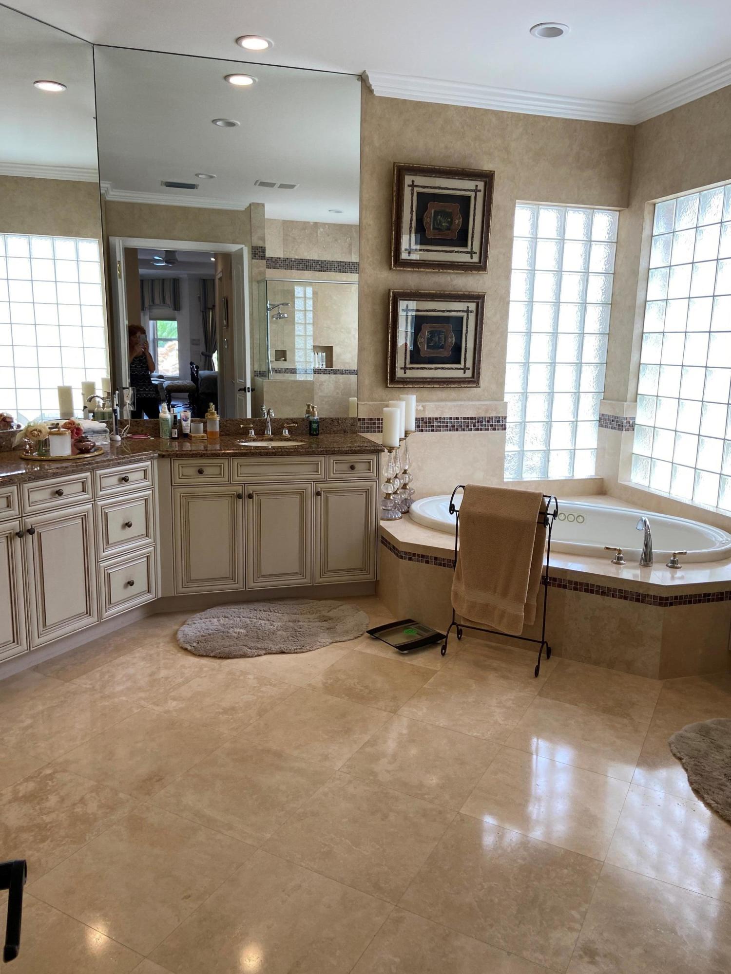 16456 Braeburn Ridge Trail Delray Beach, FL 33446 - Photo 18 of 25 a large swimming pool and outdoor seating