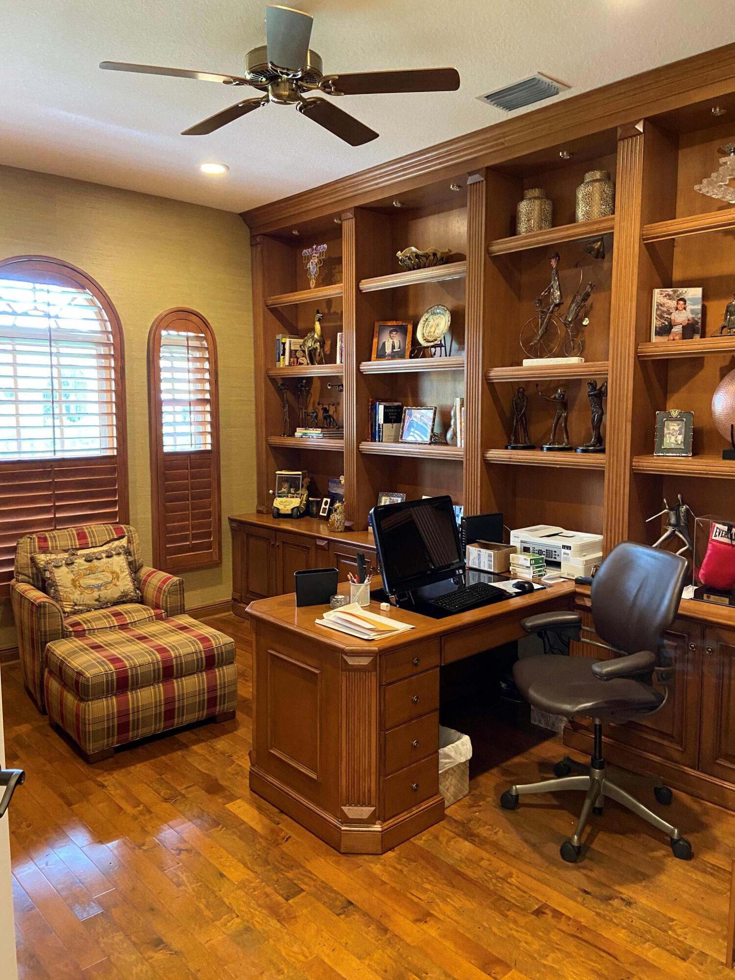 16456 Braeburn Ridge Trail Delray Beach, FL 33446 - Photo 19 of 25 a view of a workspace with furniture and a window