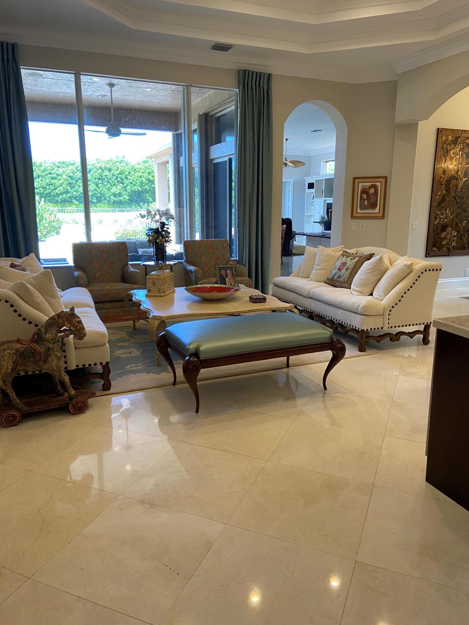 16456 Braeburn Ridge Trail Delray Beach, FL 33446 - Photo 3 of 25 a living room with furniture pool table and a large window