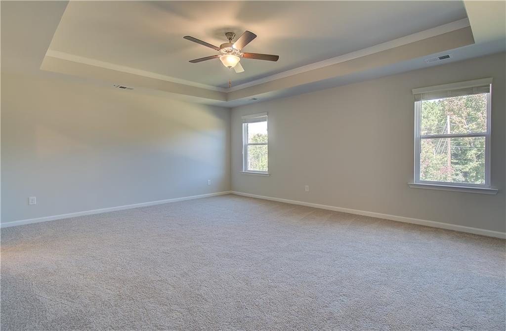 257 Chiswick Loop Stockbridge, GA 30281 - Photo 22 of 32 an empty room with a window