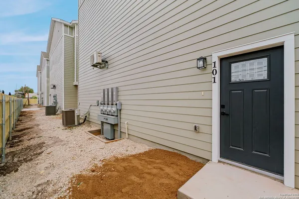 a view of a backyard of a house
