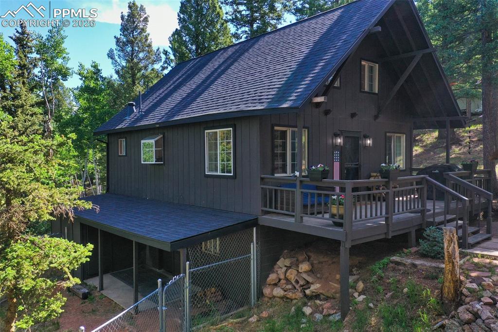377 Ridge Road Divide, CO 80814 - Photo 10 of 50 a view of house with yard and sitting area