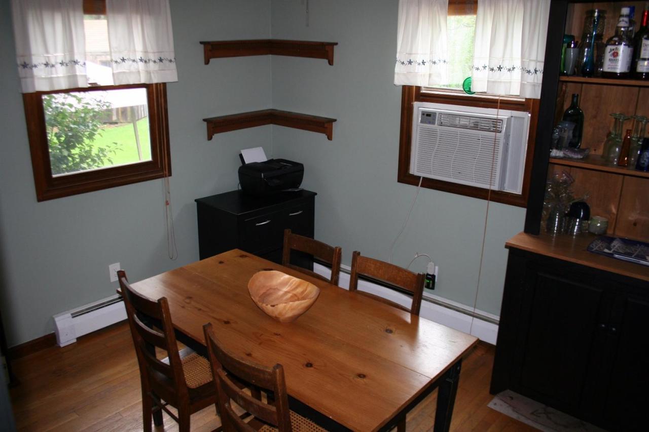 35 Chatham Lane Mashpee, MA 02649 - Photo 11 of 16 a view of a dining room with furniture and window
