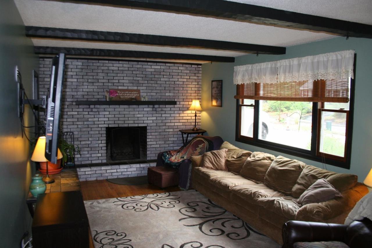 35 Chatham Lane Mashpee, MA 02649 - Photo 2 of 16 a living room with furniture and a fireplace
