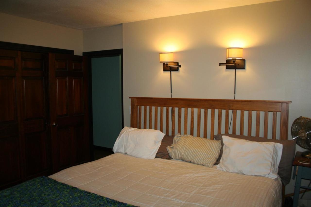 35 Chatham Lane Mashpee, MA 02649 - Photo 5 of 16 a bedroom with a bed and two lamp