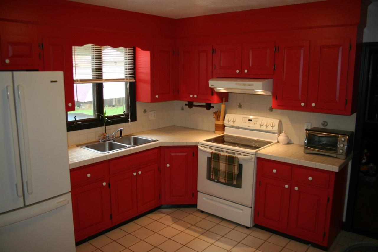 35 Chatham Lane Mashpee, MA 02649 - Photo 9 of 16 a kitchen with a stove sink and cabinets
