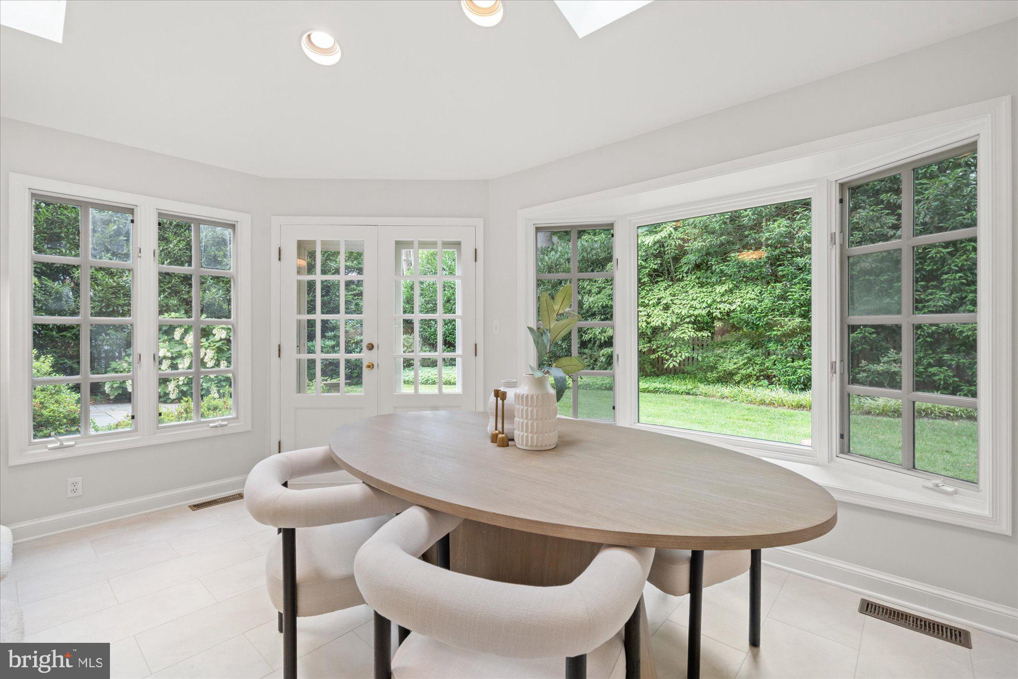 5016 Scarsdale Road Bethesda, MD 20816 - Photo 6 of 37 French doors lead to patio/stunning flat backyard