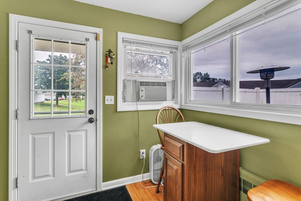 123 Outer Drive, Unit 123 Chicopee, MA 01022 - Photo 16 of 33 a view of a room with furniture and a window