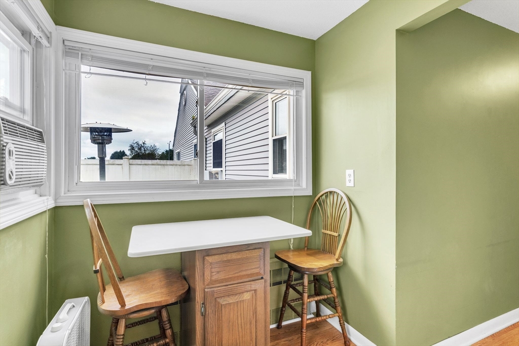 123 Outer Drive, Unit 123 Chicopee, MA 01022 - Photo 17 of 33 a view of a chair and table in the balcony