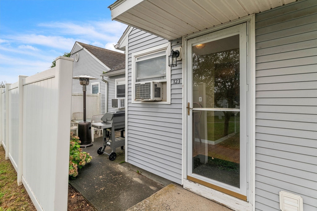 123 Outer Drive, Unit 123 Chicopee, MA 01022 - Photo 27 of 33 a view of a house with backyard