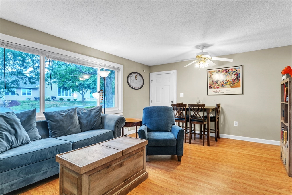 123 Outer Drive, Unit 123 Chicopee, MA 01022 - Photo 10 of 33 a living room with furniture and a large window