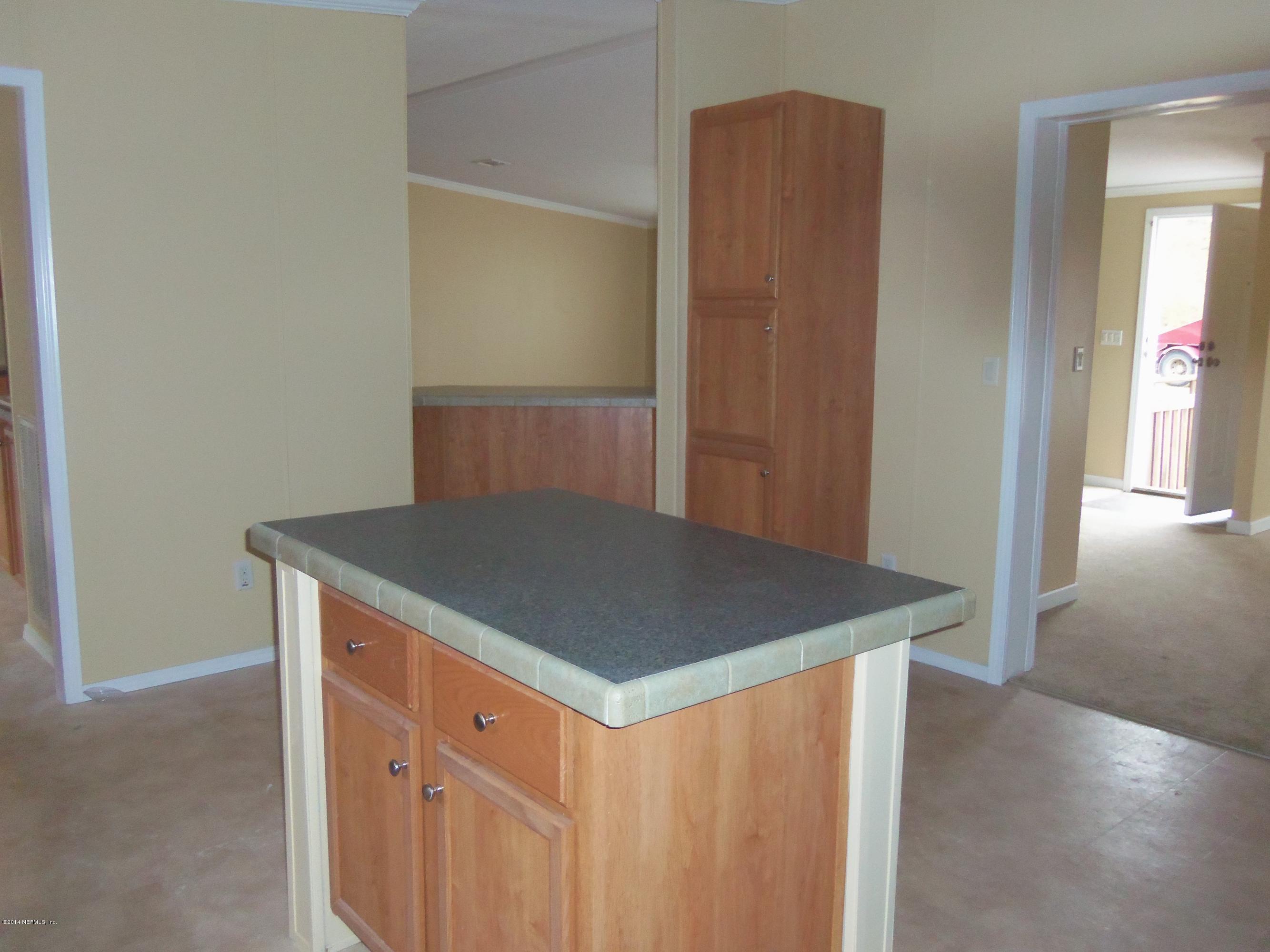 4979 Bent Twig Road Middleburg, FL 32068 - Photo 4 of 13 KitchenIsland