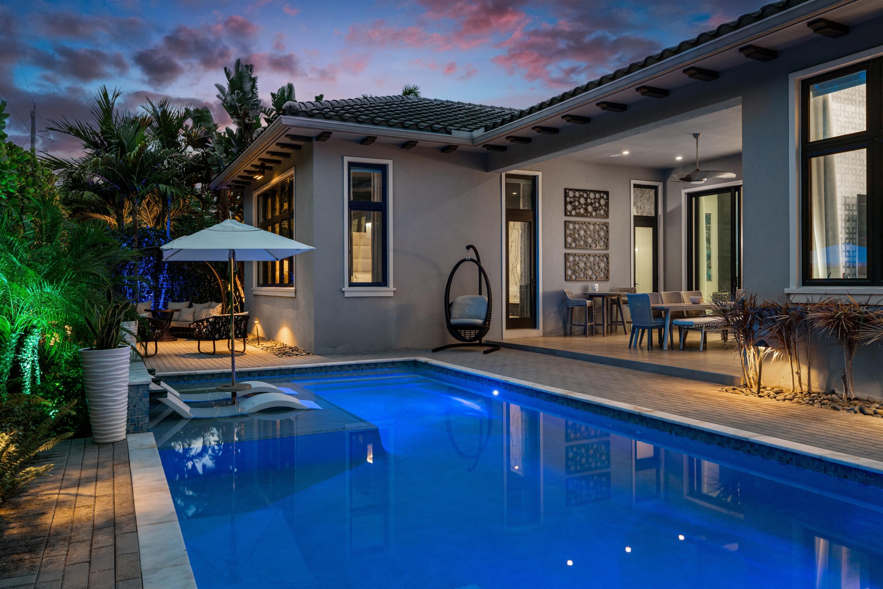 904 Northwest 2nd Street Boca Raton, FL 33486 - Photo 36 of 41 POOL_TO_REAR_ANGLE_LEFT_TWILIGHT