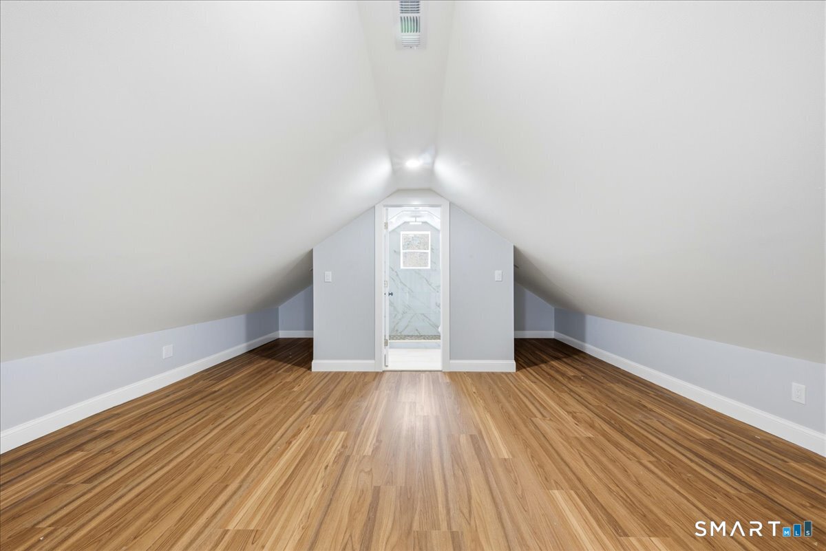 52 Coram Street Hamden, CT 06517 - Photo 33 of 40 a view of an empty room and window