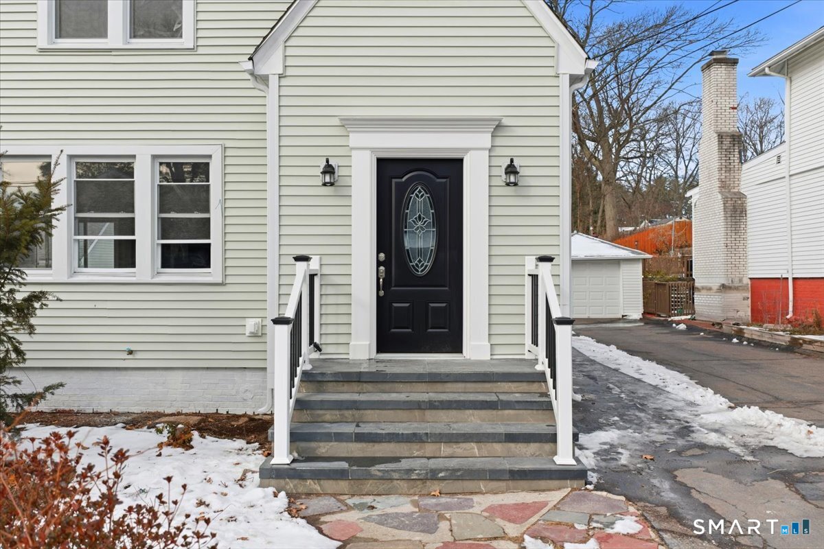 52 Coram Street Hamden, CT 06517 - Photo 4 of 40 a front view of a house