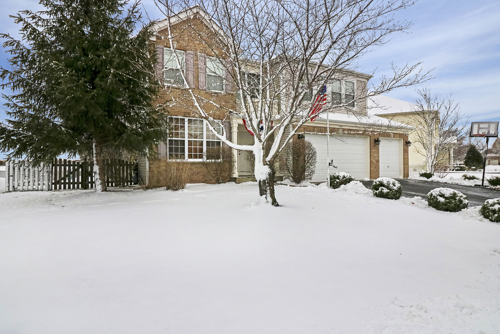428 Cardinal Lane Bolingbrook, IL 60490 - Photo 2 of 36 a view of a house with snow on the road