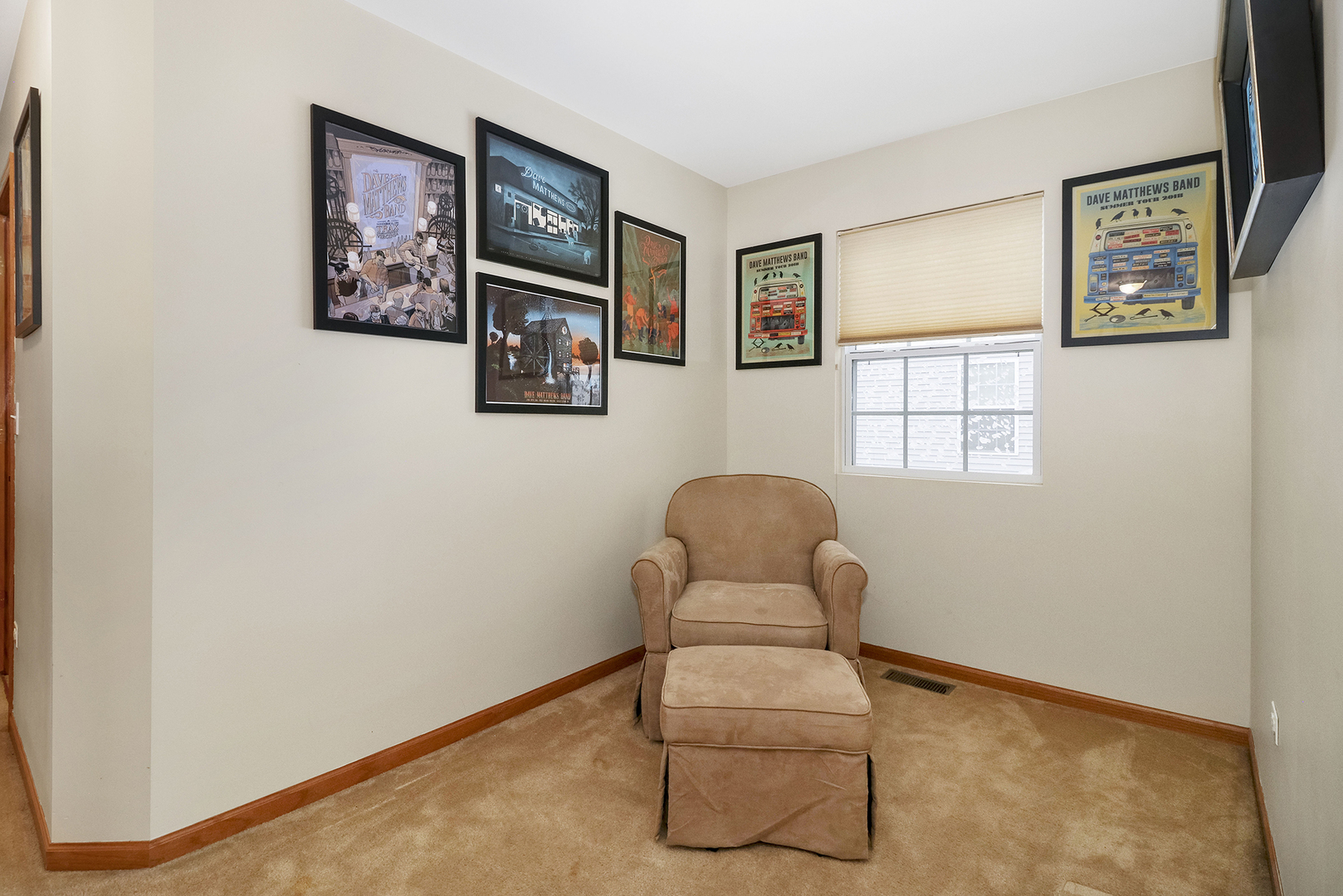 428 Cardinal Lane Bolingbrook, IL 60490 - Photo 25 of 36 a room with furniture and paintings on wall
