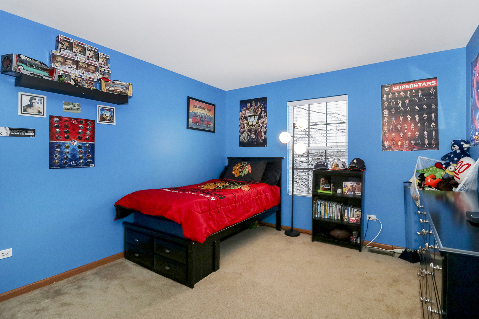 428 Cardinal Lane Bolingbrook, IL 60490 - Photo 26 of 36 a bedroom with a bed and a couch