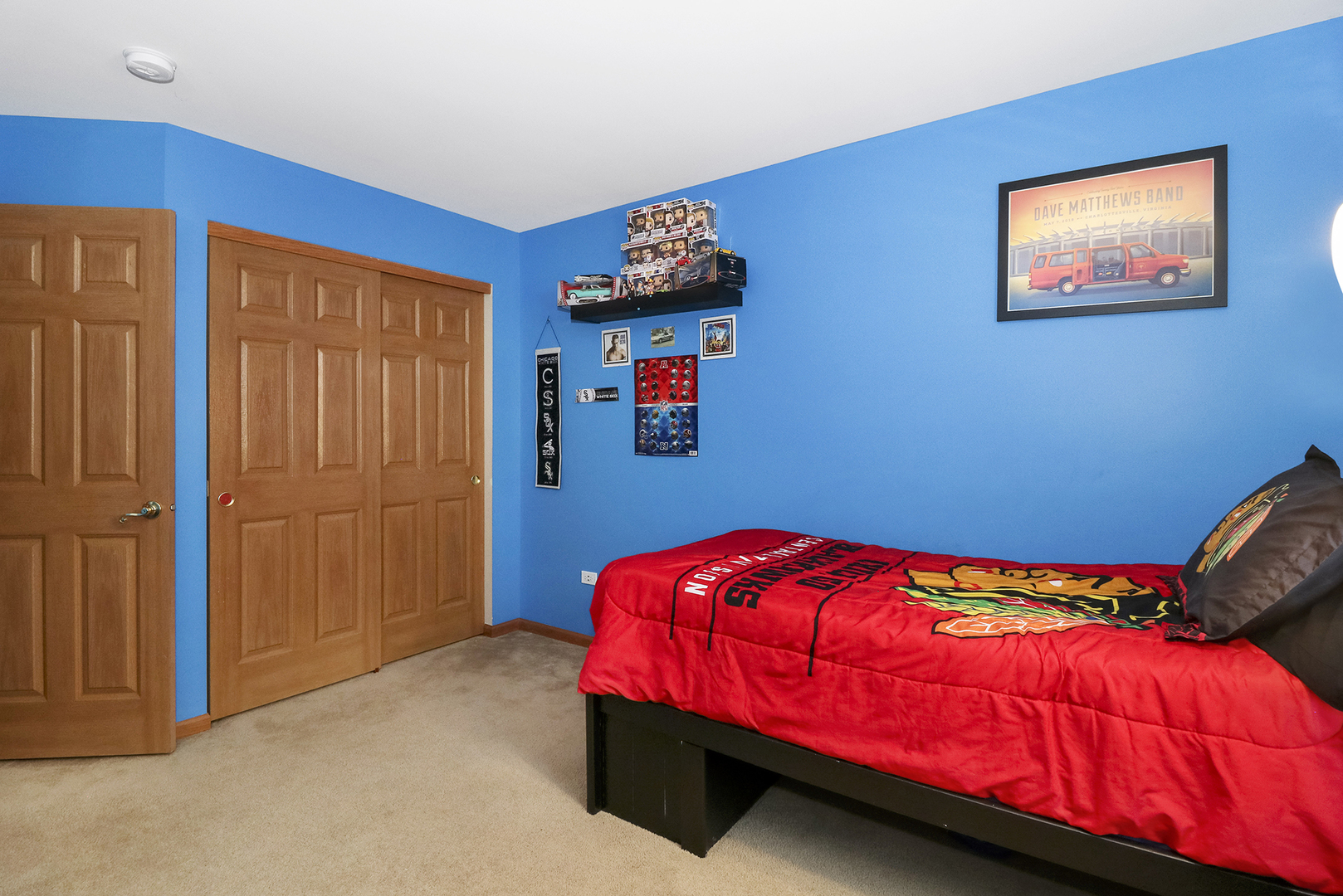 428 Cardinal Lane Bolingbrook, IL 60490 - Photo 27 of 36 a bedroom with a bed and a painting on the wall