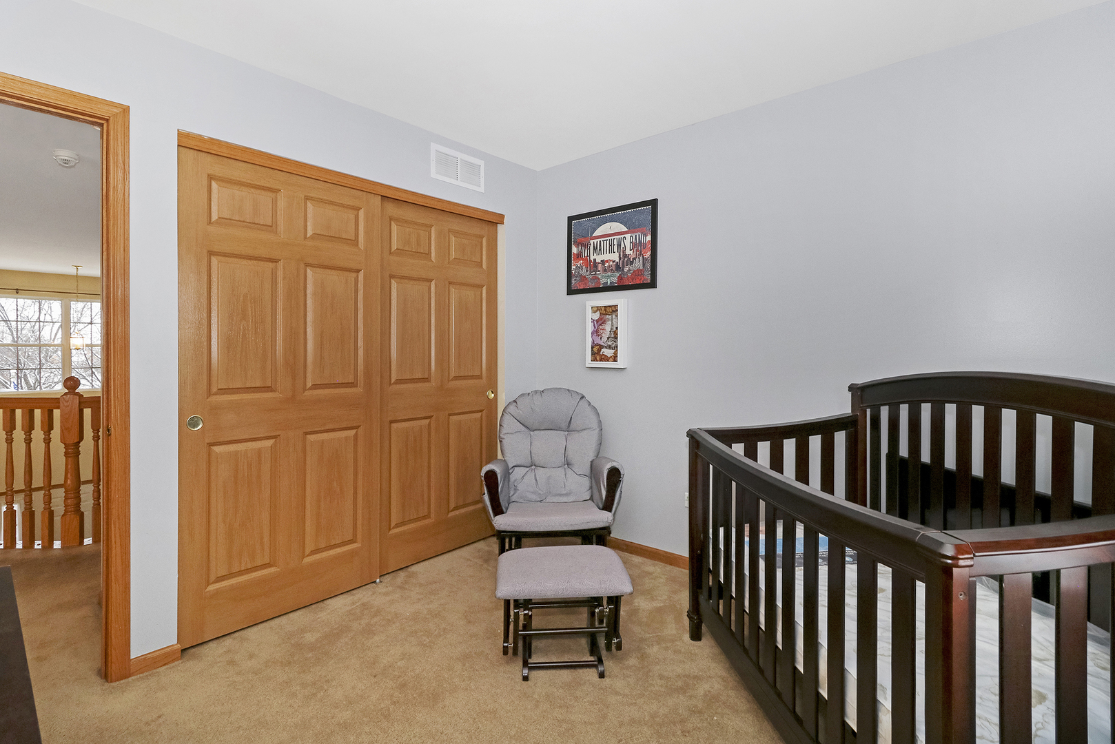 428 Cardinal Lane Bolingbrook, IL 60490 - Photo 30 of 36 a bedroom with furniture and a chair