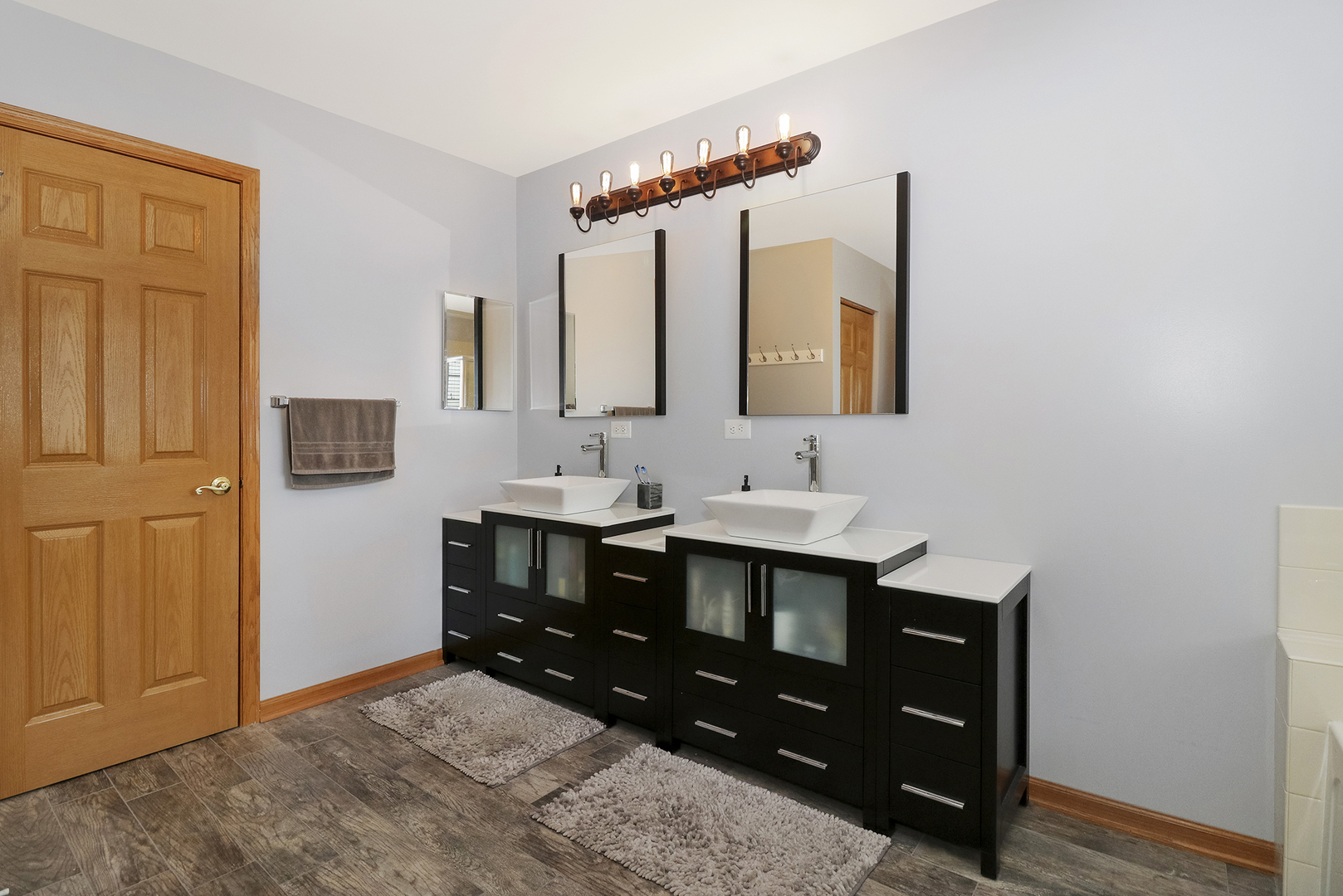 428 Cardinal Lane Bolingbrook, IL 60490 - Photo 35 of 36 a bathroom with a sink vanity and mirror