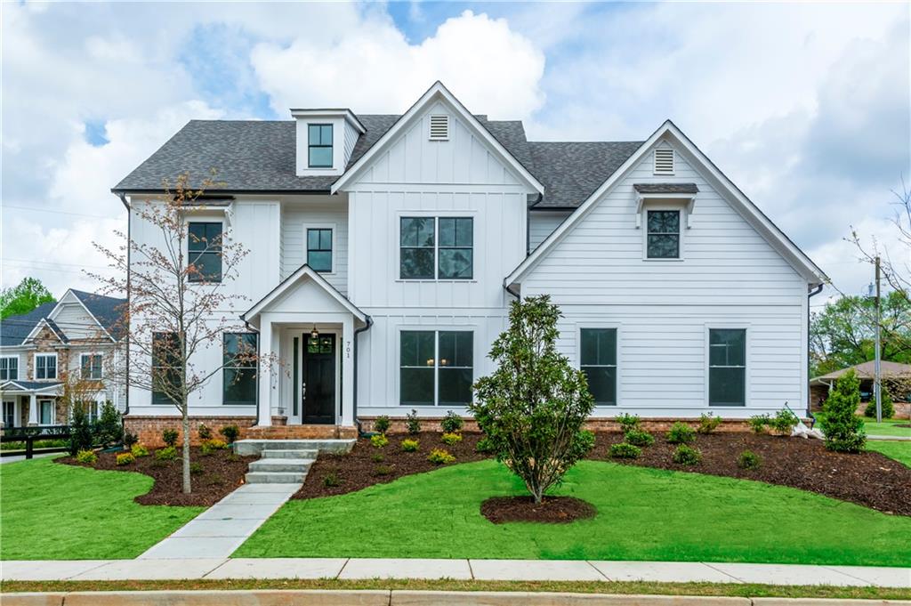 THE STUNNING LONGFORD AT RESERVE AT MORNINGSIDE BOASTS A BEAUTIFUL BRICK ELEVATION & WELCOMING FRONT PORCH *HOME TO BE BUILT-PHOTOS ARE REPRESENTATION OF HOME*